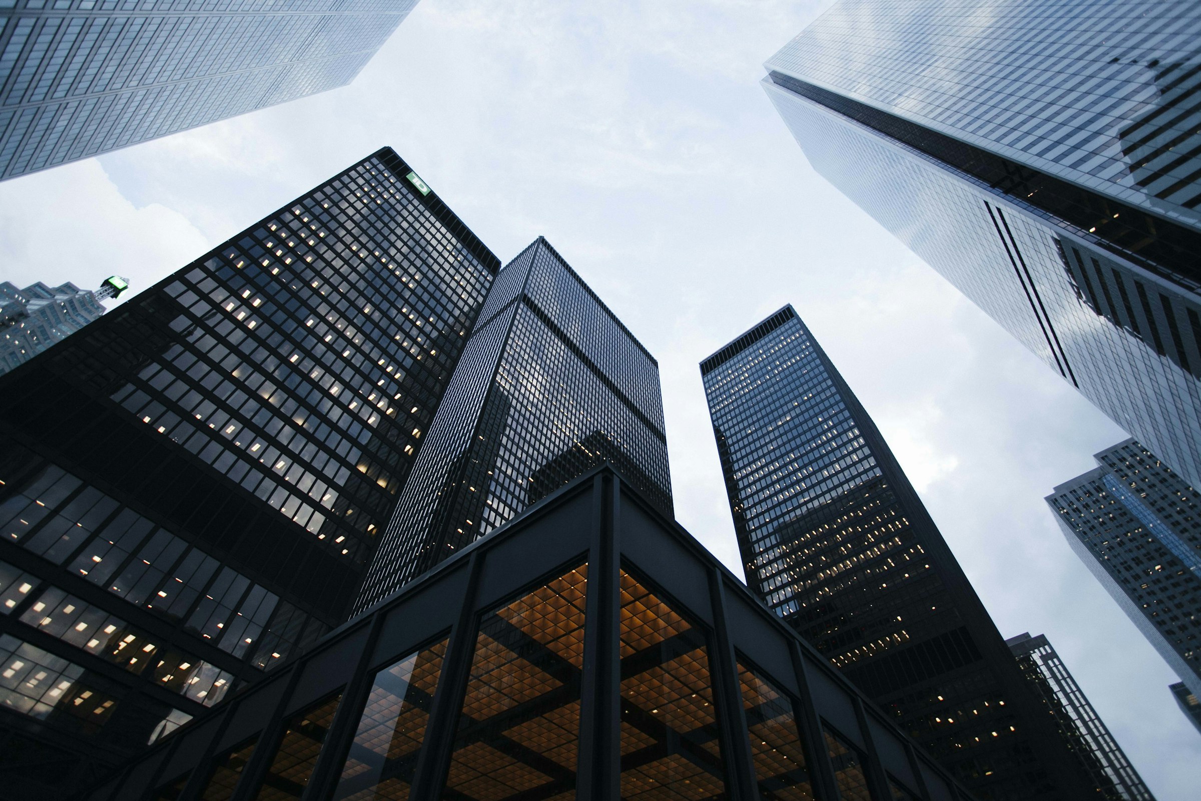 Modern glass skyscrapers seen from street level